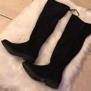 Thigh high black boots